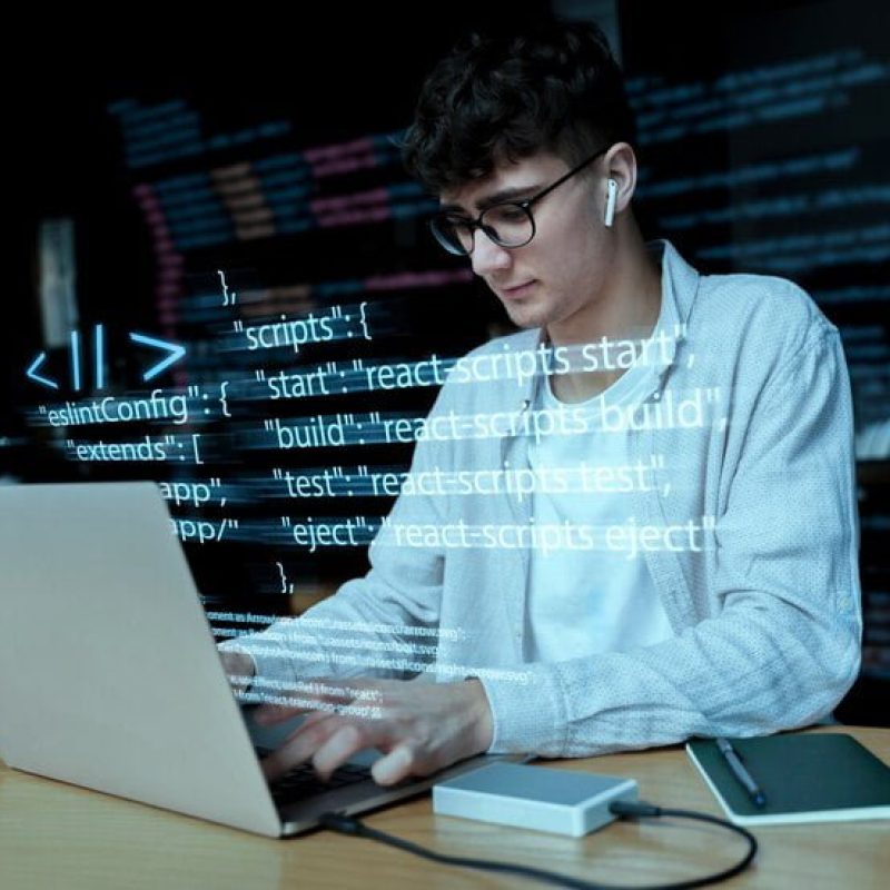 programming-background-with-person-working-with-codes-computer_23-2150010130